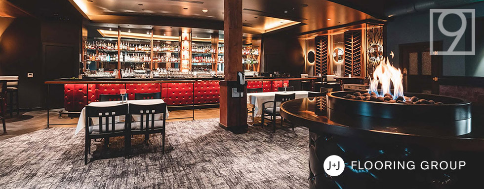 Large upscale bar with gray and black J+J Kinetex Carpet
